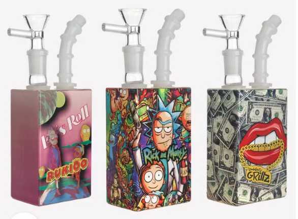 Three glass bongs with custom printed character boxes