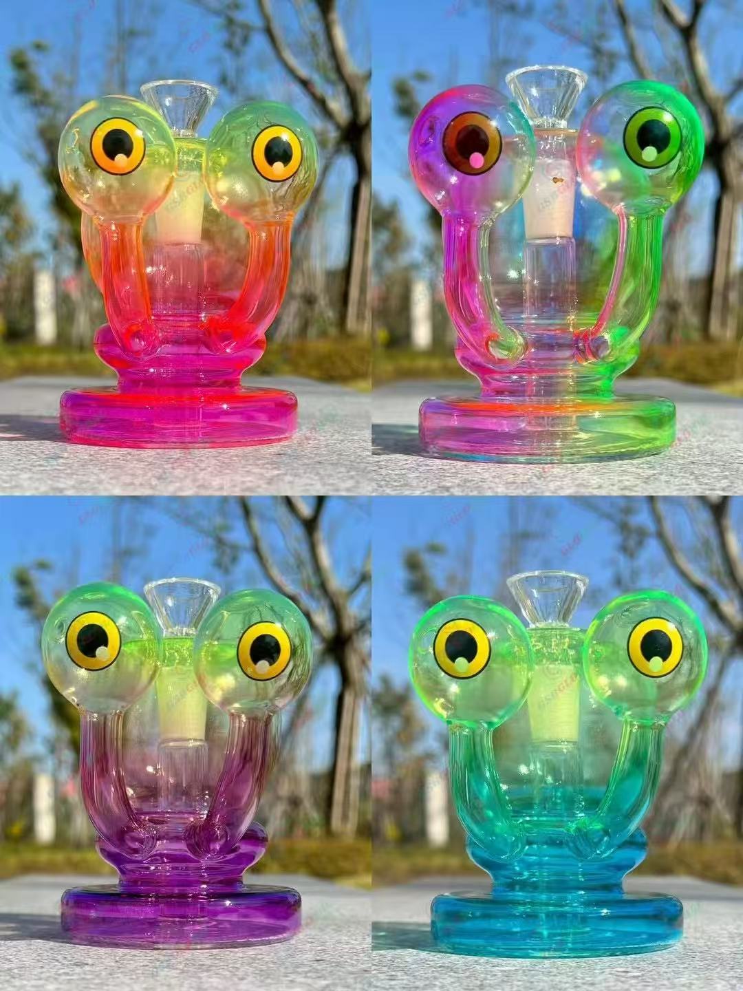 Beaker-style glass bongs and percolator dab rigs displayed together for wholesale buyers