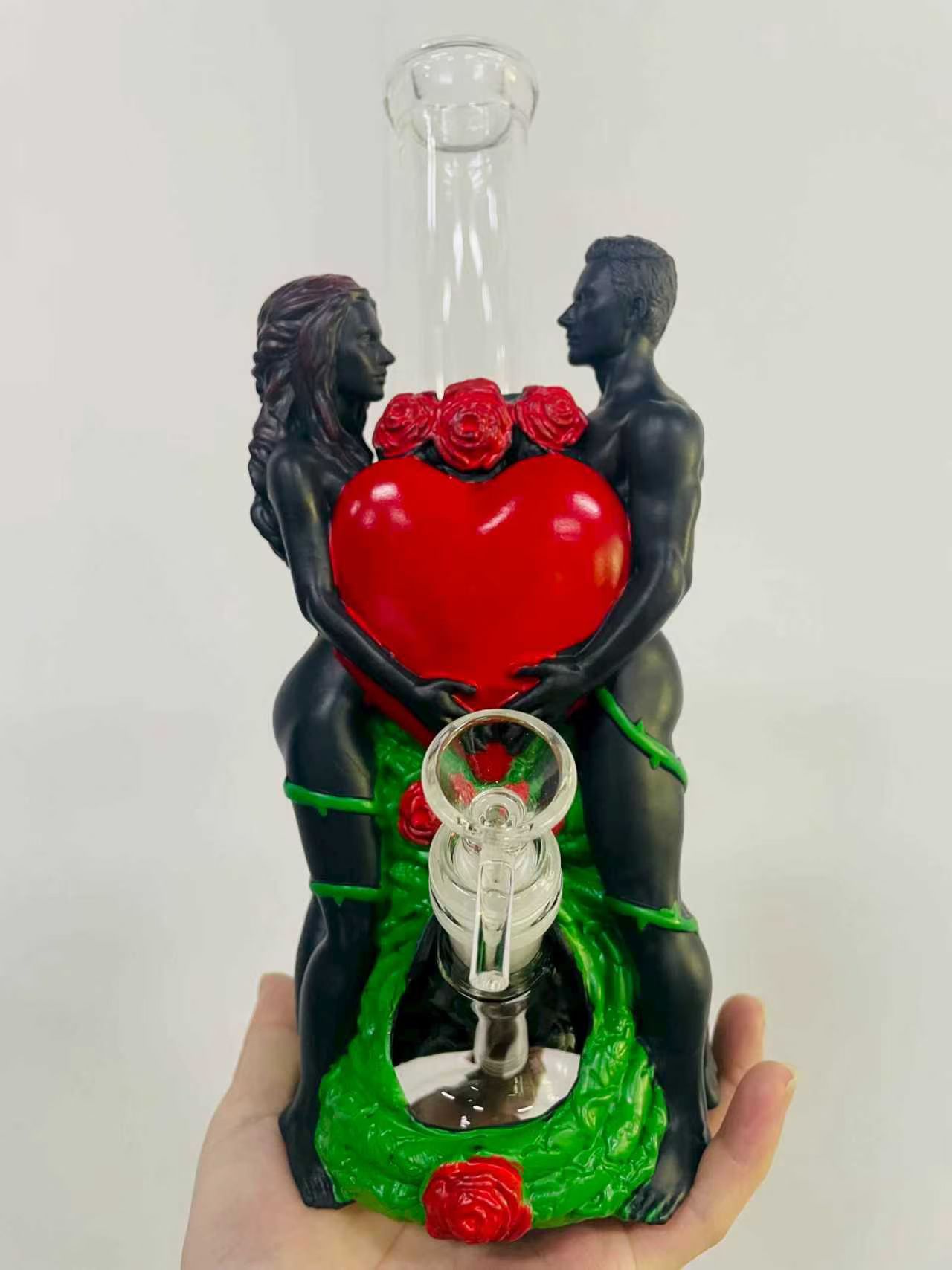 Romantic novelty glass water pipe with sculpted couple holding a red heart surrounded by roses