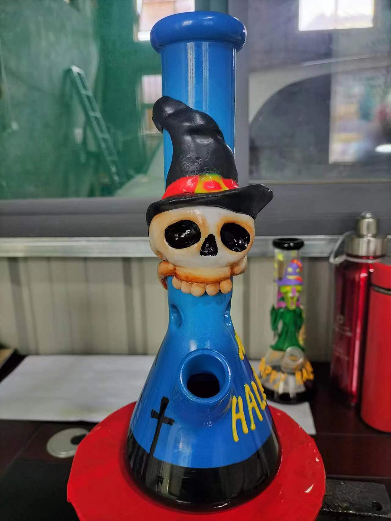 variety of glass hand pipes including spoons and steamrollers