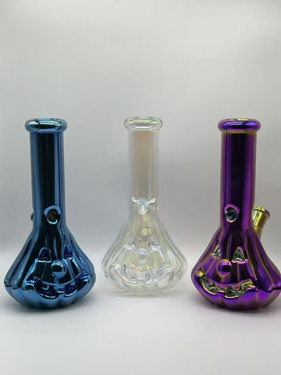 Collection of small colorful glass bongs for wholesale smoke shop inventory display