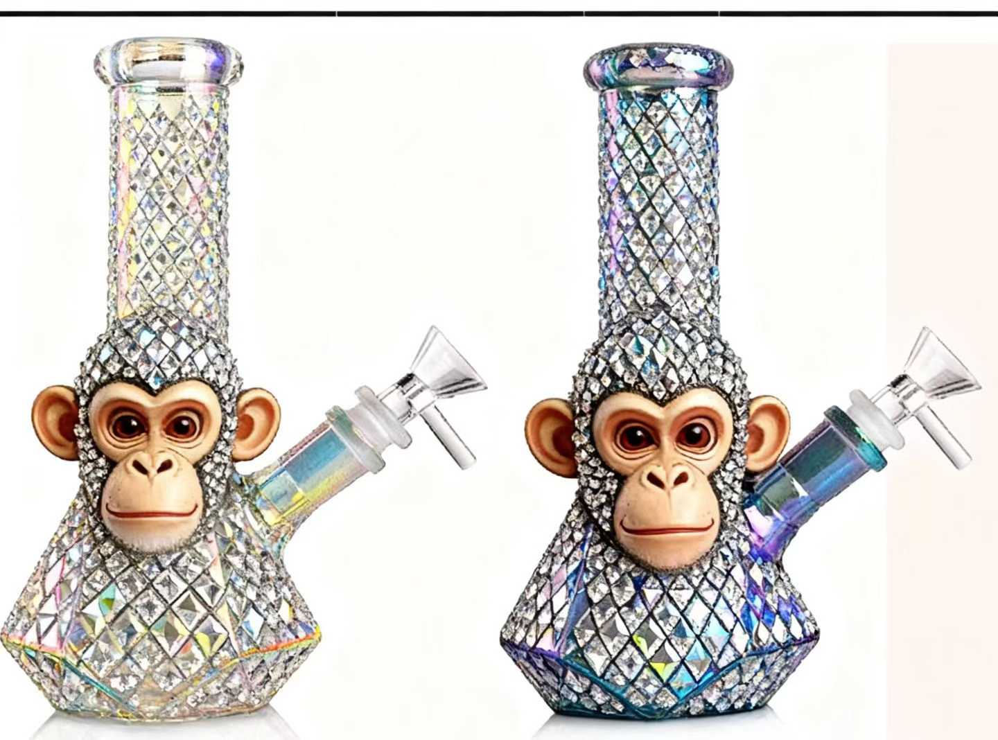 Clear glass bong with golden fumed star pattern accent held by gloved hand showing precious metal application