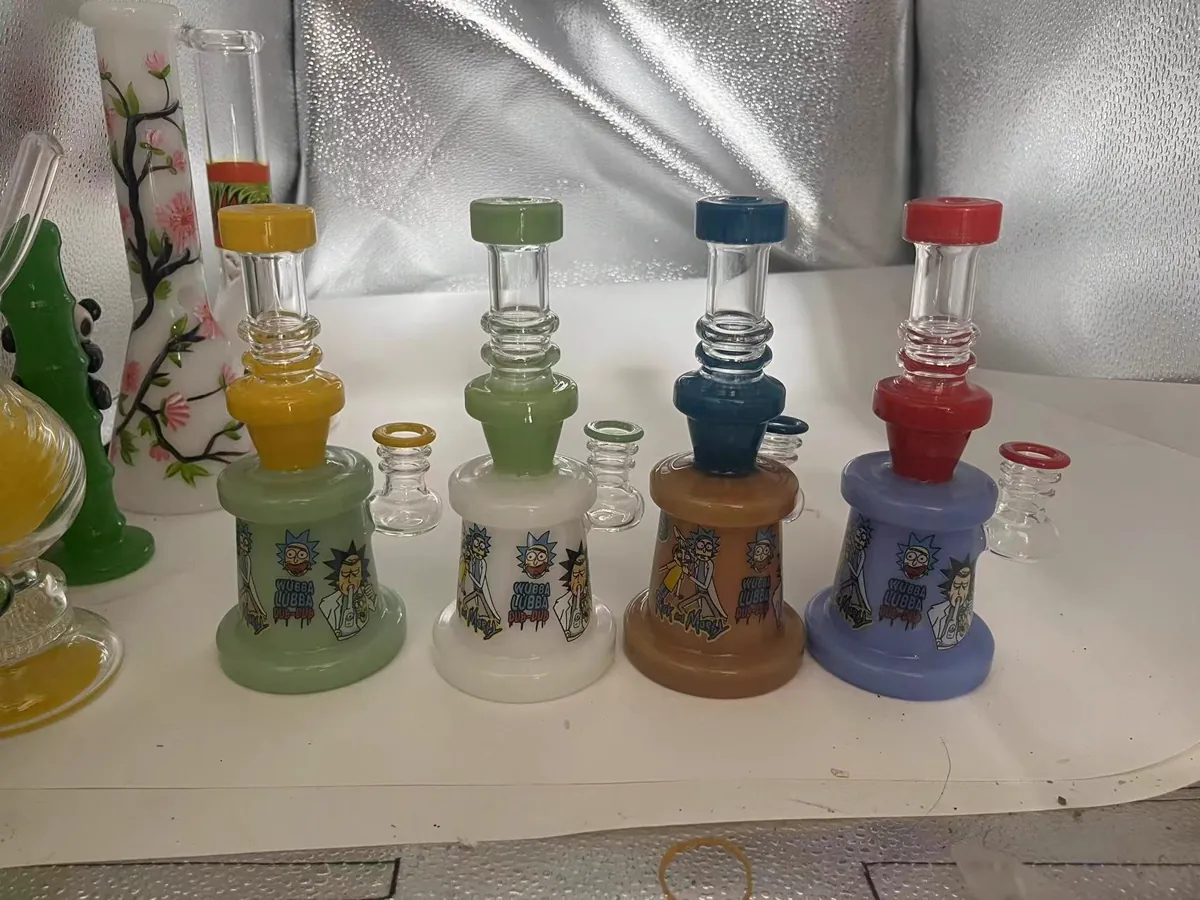 Four cartoon Rick and Morty themed dab rigs in green white tan blue