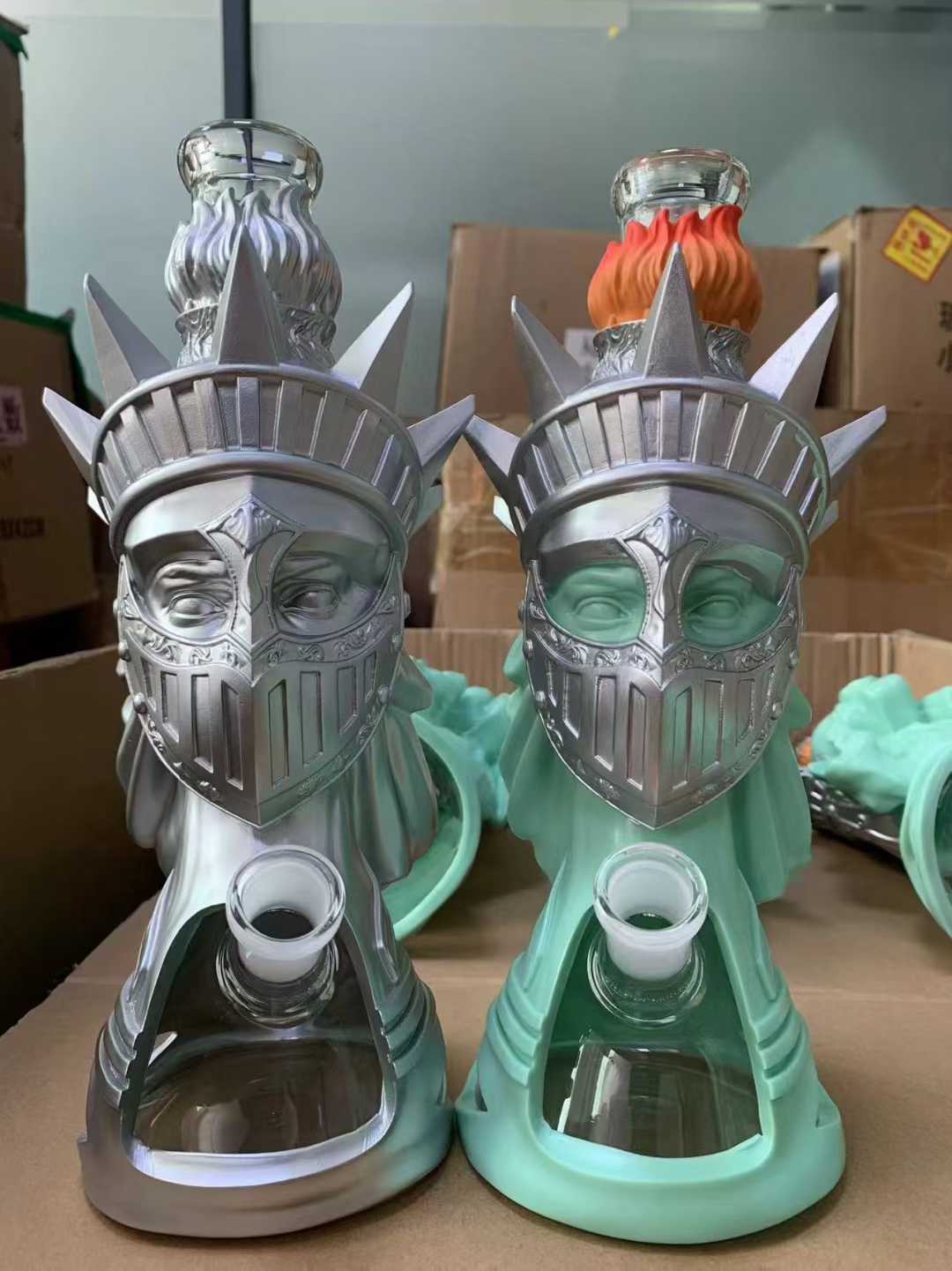 Two glass bongs with dual arms featuring gold and silver fumed percolator accents